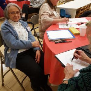 Everyone gives caricature drawing a try.